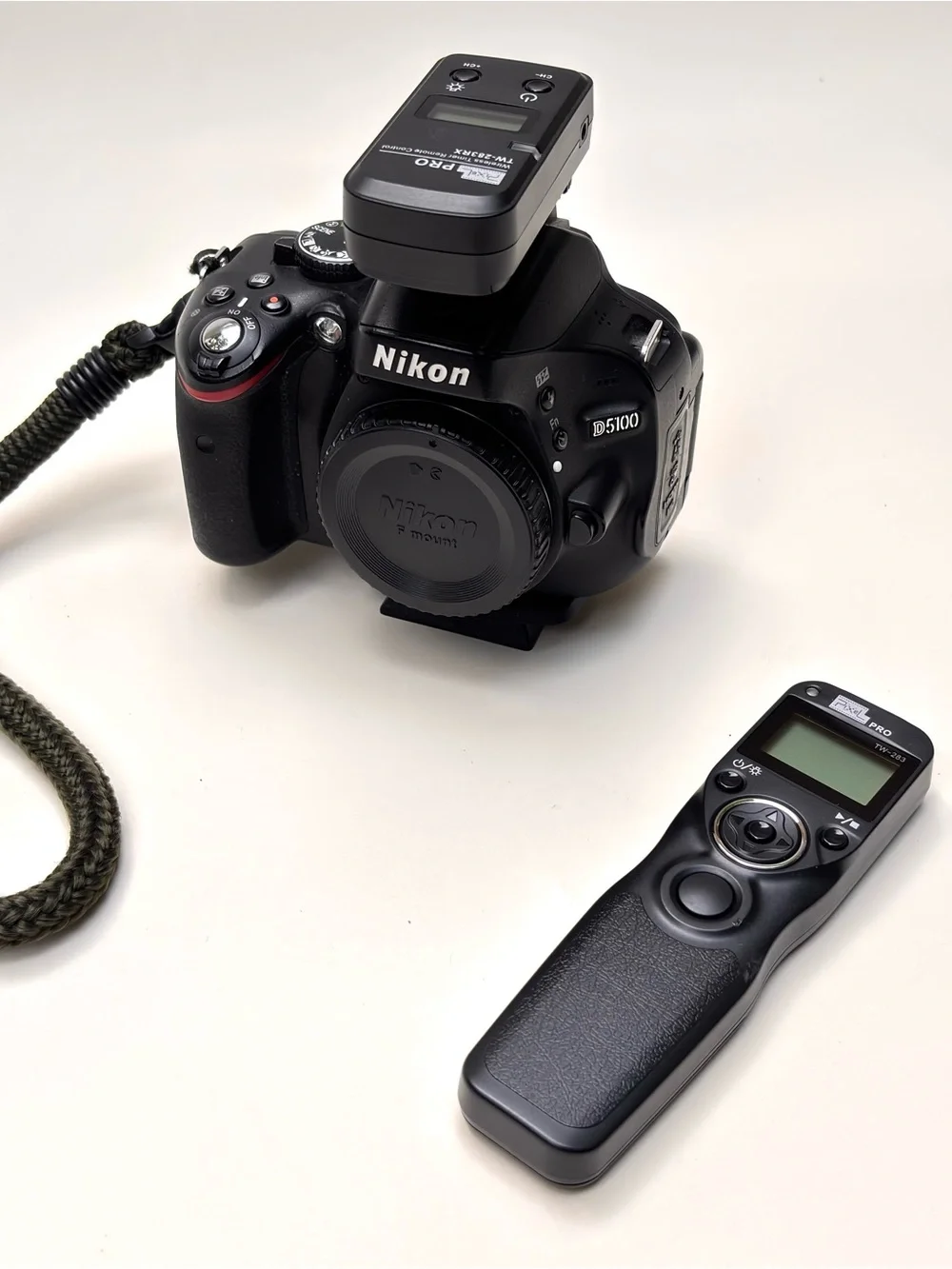 Nikon Black DSLR Camera Body with Black Lenses and Accessories